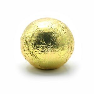 White chocolate truffle in gold foil wedding chocolates
